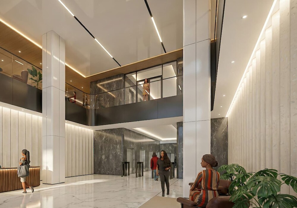 Renovated modern lobby at 260 Madison Avenue featuring marble finishes and luxury building amenities.