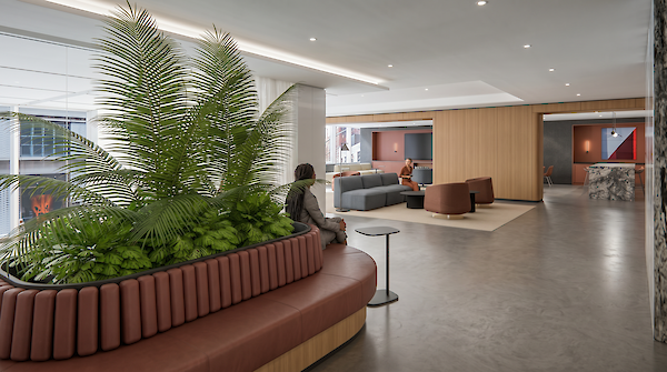 Modern collaborative spaces at 260 Madison Avenue designed for team connectivity, offering a warm and professional environment for the next generation of Midtown office tenants.